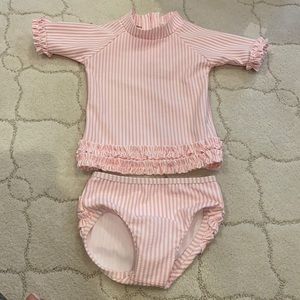 Ruffle butts pink searsucker swimsuit